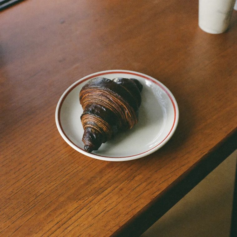 A chocolate croissant on a plate